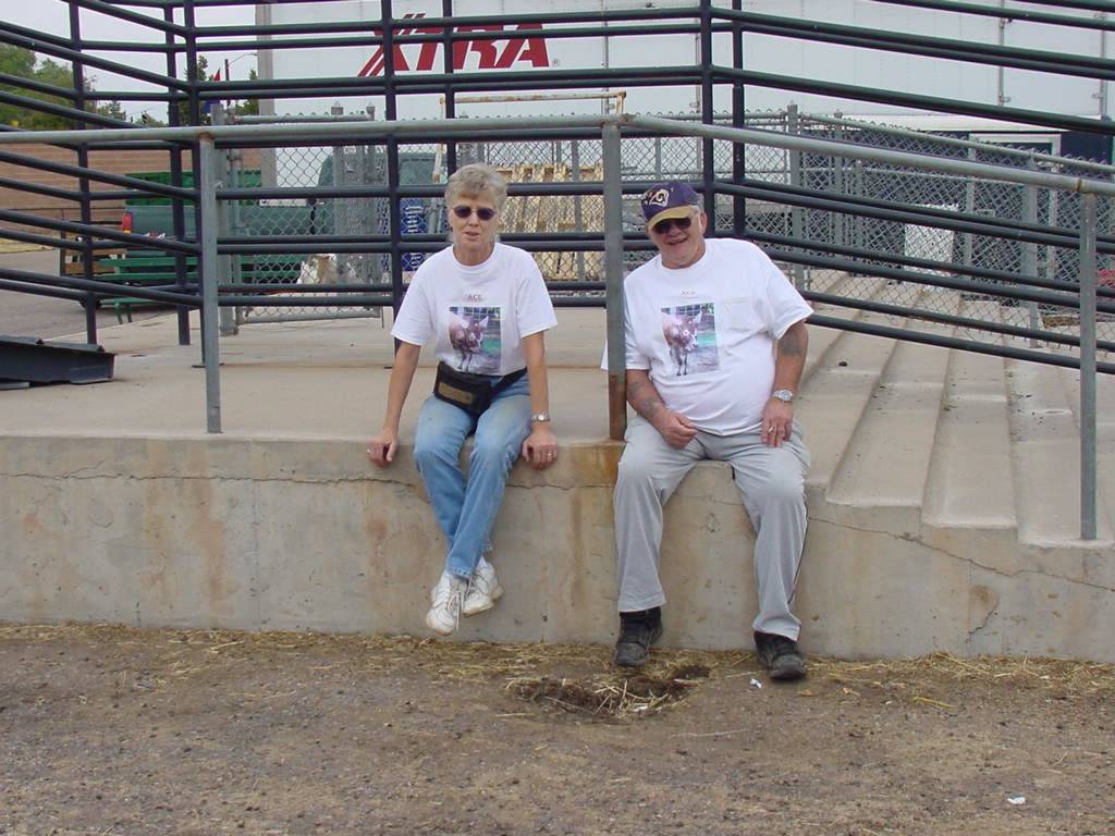 Barbara and Wayne Britton showing off their bull and their shirts.