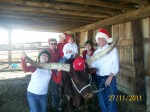 Richens family portrait.  Ryan and Mindy with their share of the Gilbert Grandclan including Rose their Foundation Pure cow.