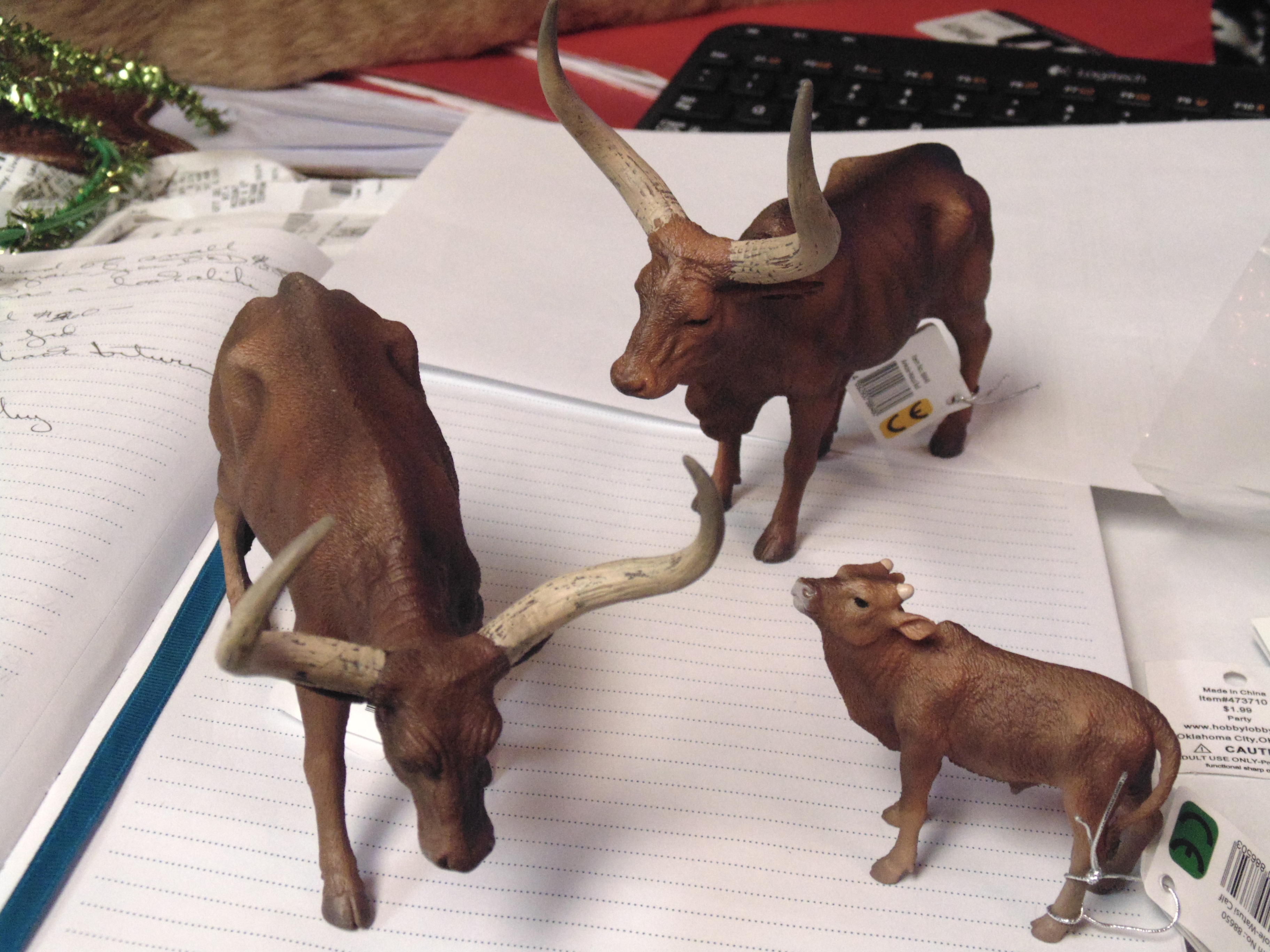 Watusi bull, cow and calf figurines.