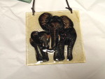 Painted glass elephant tile.